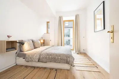 Ein Bett oder Betten in einem Zimmer der Unterkunft Grand Apartment close to the Isar and Citycenter