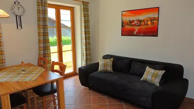 Ein Sitzbereich in der Unterkunft Ferienwohnung Zum Wiham