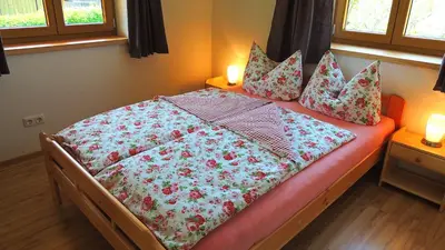 Ein Bett oder Betten in einem Zimmer der Unterkunft Ferienwohnung Zum Wiham