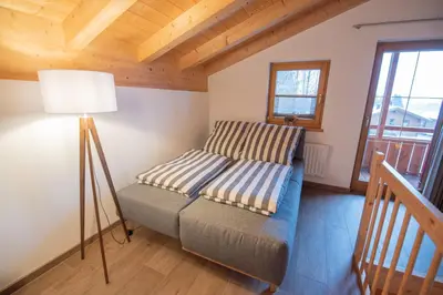 Ein Bett oder Betten in einem Zimmer der Unterkunft Hirsch Chalet #Sauna