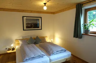 Ein Bett oder Betten in einem Zimmer der Unterkunft Bleierhof
