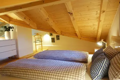 Ein Bett oder Betten in einem Zimmer der Unterkunft Bleierhof