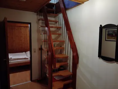 Ein Bett oder Betten in einem Zimmer der Unterkunft ciao-aschau Sachrang Haus Spitzstein FeWo Angelika