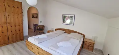 Ein Bett oder Betten in einem Zimmer der Unterkunft ciao-aschau Gschwendtnerhof Ap12 Göbel