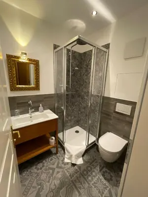 Ein Badezimmer in der Unterkunft ciao-aschau Haus zur Burg Ap112 Burgblick