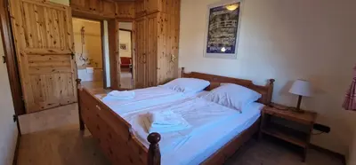 Ein Bett oder Betten in einem Zimmer der Unterkunft ciao-aschau Gschwendtnerhof Ap16 Bunk