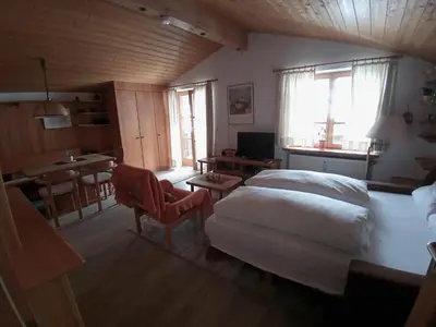 Ein Bett oder Betten in einem Zimmer der Unterkunft ciao-aschau FeWo Röder