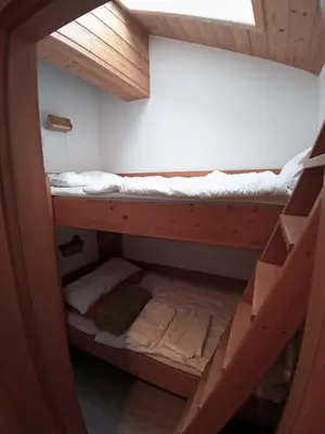 Ein Bett oder Betten in einem Zimmer der Unterkunft ciao-aschau FeWo Röder