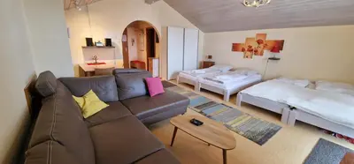 Ein Bett oder Betten in einem Zimmer der Unterkunft ciao-aschau FeWo Schöne-Aussicht