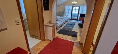 Ein Bett oder Betten in einem Zimmer der Unterkunft ciao-aschau FeWo Schöne-Aussicht