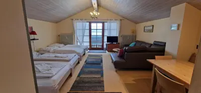 Ein Bett oder Betten in einem Zimmer der Unterkunft ciao-aschau FeWo Schöne-Aussicht