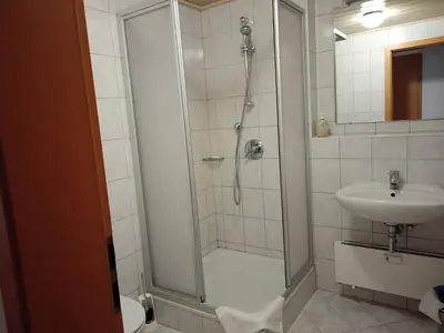 Ein Badezimmer in der Unterkunft ciao-aschau Grenzhub FeWo 208 Bär