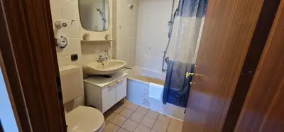 Ein Badezimmer in der Unterkunft ciao-aschau Gschwendtnerhof Ap19 SchölzkeM
