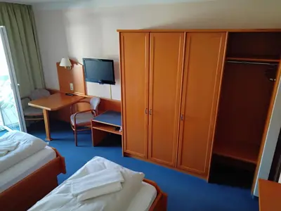 Ein Bett oder Betten in einem Zimmer der Unterkunft ciao-aschau Haus zur Burg Apn220 Mina