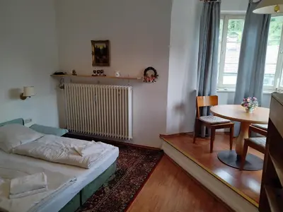 Ein Bett oder Betten in einem Zimmer der Unterkunft ciao-aschau Haus zur Burg Ap108 Weber