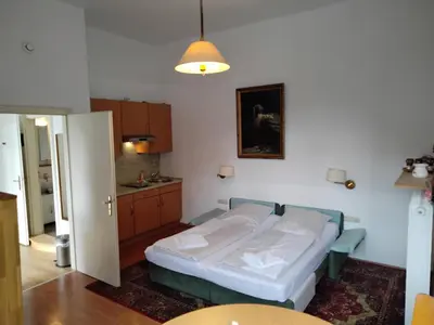 Ein Bett oder Betten in einem Zimmer der Unterkunft ciao-aschau Haus zur Burg Ap108 Weber