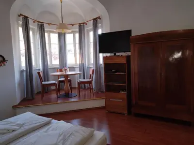 Ein Bett oder Betten in einem Zimmer der Unterkunft ciao-aschau Haus zur Burg Ap108 Weber