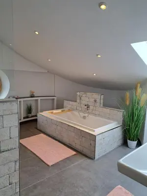 Ein Bett oder Betten in einem Zimmer der Unterkunft Ferienwohnung Alpenpanorama