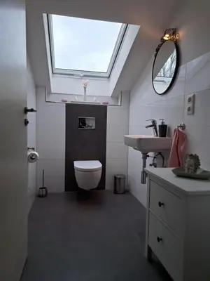 Ein Badezimmer in der Unterkunft Ferienwohnung Alpenpanorama