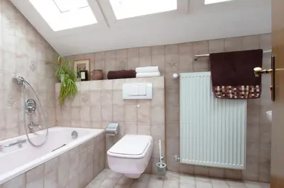 Ein Badezimmer in der Unterkunft Ferienhaus Antdorfer Gartenglück