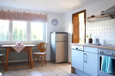 Küche/Küchenzeile in der Unterkunft Ferienhaus Antdorfer Gartenglück