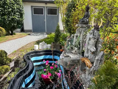 Ein Garten an der Unterkunft Guesthouse David