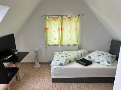 Ein Bett oder Betten in einem Zimmer der Unterkunft Guesthouse David