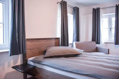 Ein Bett oder Betten in einem Zimmer der Unterkunft Hotel Pame Grill