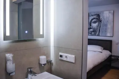 Ein Bett oder Betten in einem Zimmer der Unterkunft Hotel Pame Grill