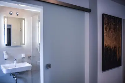 Ein Badezimmer in der Unterkunft Hotel Pame Grill