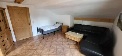 Ein Bett oder Betten in einem Zimmer der Unterkunft Sigrids Ferienwohnung Bad Tölz