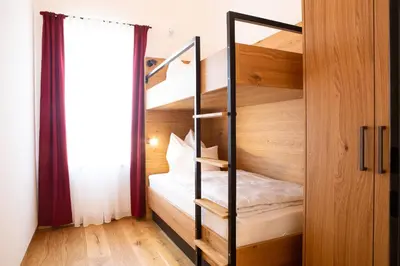 Ein Bett oder Betten in einem Zimmer der Unterkunft Gasthof & Hotel Bichler