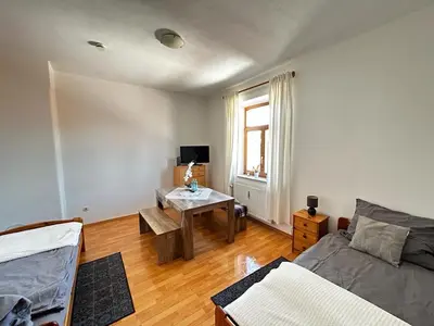 Ein Bett oder Betten in einem Zimmer der Unterkunft Wunderschönes Appartement Nahe der Berge