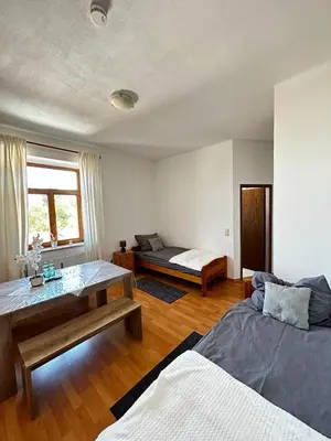 Ein Bett oder Betten in einem Zimmer der Unterkunft Wunderschönes Appartement Nahe der Berge