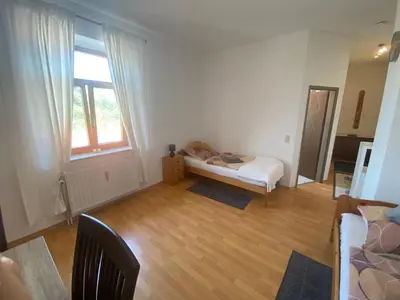 Ein Bett oder Betten in einem Zimmer der Unterkunft Wunderschönes Appartement Nahe der Berge