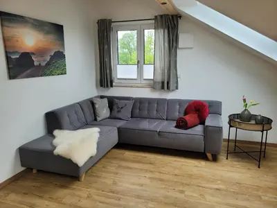 Ein Sitzbereich in der Unterkunft Ferienwohnung Klauserhof