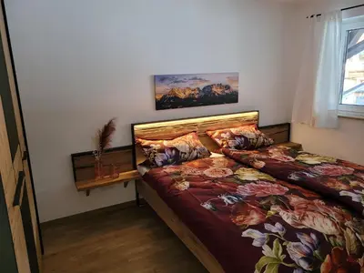 Ein Bett oder Betten in einem Zimmer der Unterkunft Ferienwohnung Klauserhof