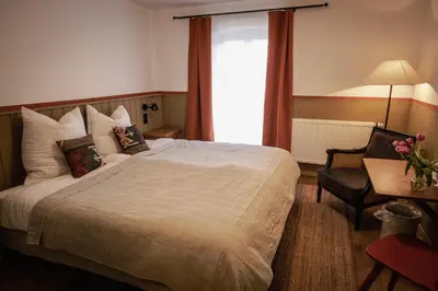 Ein Bett oder Betten in einem Zimmer der Unterkunft Kastanienhof Pfettrach