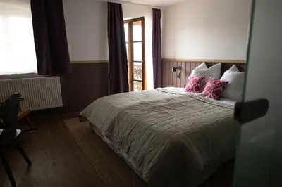 Ein Bett oder Betten in einem Zimmer der Unterkunft Kastanienhof Pfettrach