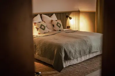 Ein Bett oder Betten in einem Zimmer der Unterkunft Kastanienhof Pfettrach