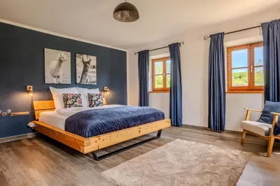 Ein Bett oder Betten in einem Zimmer der Unterkunft Ferienhof Petermühle Urlaub mit Alpakas