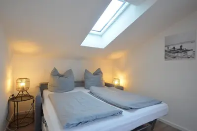 Ein Bett oder Betten in einem Zimmer der Unterkunft Ferienwohnung am Lech - Heidrun s Nest
