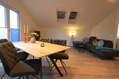 Ein Sitzbereich in der Unterkunft Ferienwohnung am Lech - Heidrun s Nest