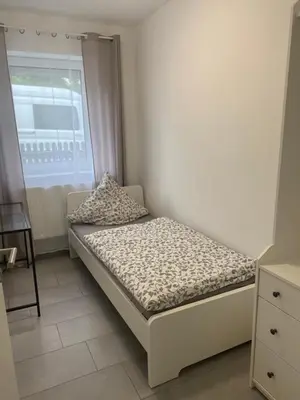 Ein Bett oder Betten in einem Zimmer der Unterkunft Unterkunft für Arbeiter und Monteure