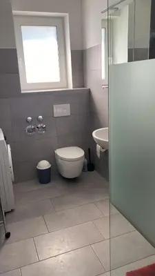 Ein Badezimmer in der Unterkunft Unterkunft für Arbeiter und Monteure