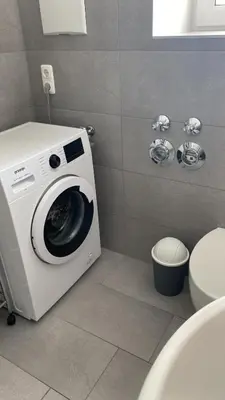 Ein Badezimmer in der Unterkunft Unterkunft für Arbeiter und Monteure
