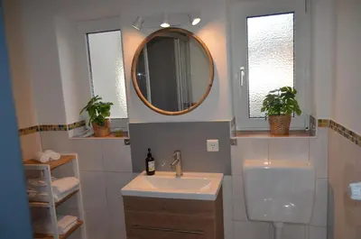 Ein Badezimmer in der Unterkunft Cozy house with garden