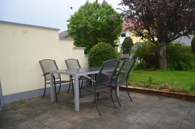 Ein Garten an der Unterkunft Cozy house with garden