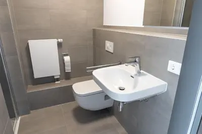 Ein Badezimmer in der Unterkunft FirstSleep Landshut