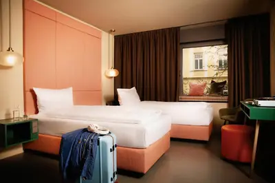 Ein Bett oder Betten in einem Zimmer der Unterkunft Design-Hotel JAMS